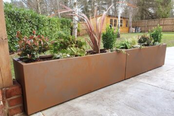Bradleys Oxide Rust Planters in Suffolk’s Garden